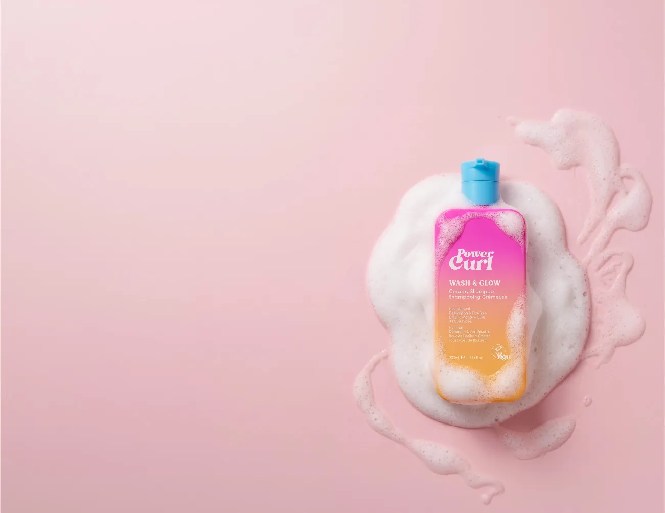 Power Curl Wash & Glow creamy shampoo on a cloud of foam